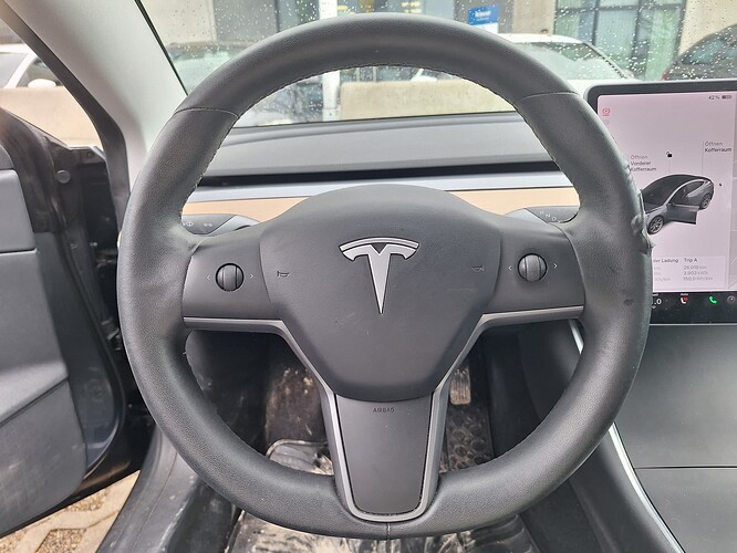 tesla original steering wheel